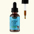 Bottle of Animal Essentials Detox Blend with dropper on a white background