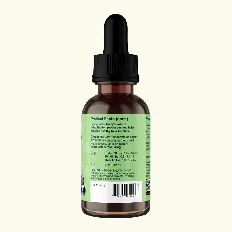 Bottle of Animal Essentials Liver Defense pet supplement with dropper and green label on a white background