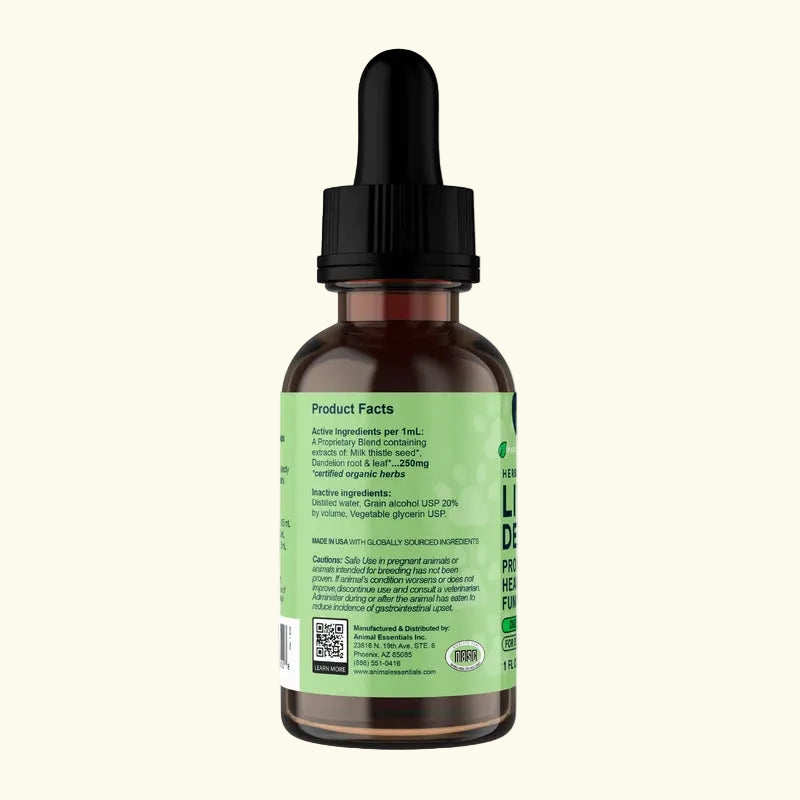 Bottle of Animal Essentials Liver Defense pet supplement with dropper and green label on a white background